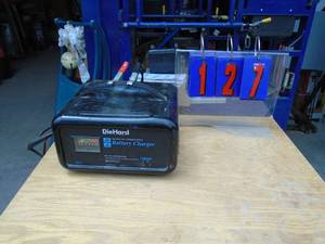 lot 127 image: Die Hard battery charger. Good used condition. As shown.