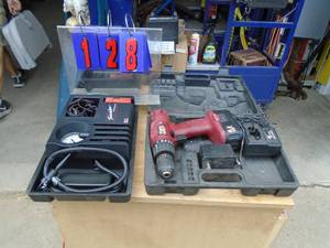 lot 128 image: 12v inflater & cordless drill. As shown.