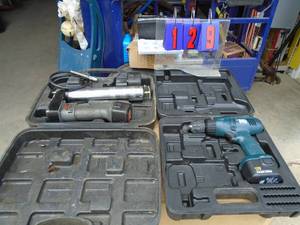lot 129 image: 12v grease gun & cordless drill. No chargers. As shown.