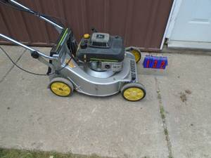 lot 132 image: John Deere lawn mower. Self propelled. Unit needs works otherwise good running mower. As shown.