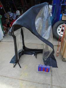 lot 136 image: Snow blower cab. Used but looks complete. As shown.