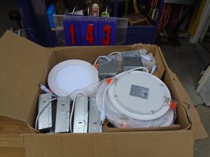 lot 143 image: Box of flush mount LED dimmable lights. New in box. Approx 12. As shown.