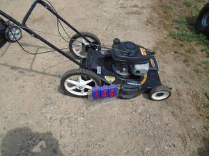 lot 147 image: Youlan Pro 5.5 hp mower. Used condition. Didnt have time to test. As shown.