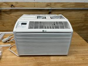 lot 34 image: LG 6,000 BTU 115-Volt Window Air Conditioner LW6017R Cools 250 Sq. Ft.