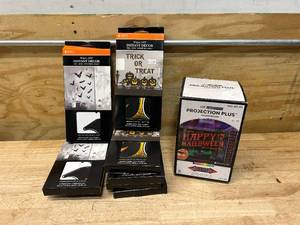 lot 93 image: Lot of Halloween Instant Wall Decorations with Projector