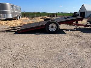 lot 12 image: Tilt Bed Skid Steer Trailer