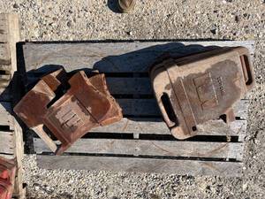lot 16 image: Minneapolis Moline and International Harvester Weights