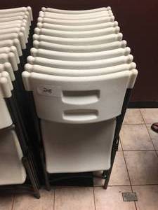 lot 28 image: Lot of 12 Heavy Duty Plastic Folding Chairs