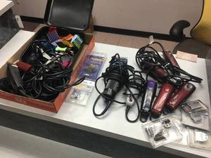 lot 102 image: Lot of 9 Clippers with Misc. Accessories and Replacement Parts