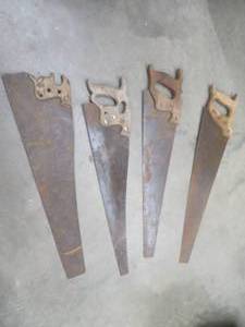 lot 17 image: VINTAGE SAWS AND TROWELS