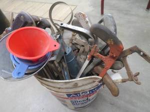 lot 22 image: BUCKET OF HACK SAWS, FUNNELS AND A CAULK GUN