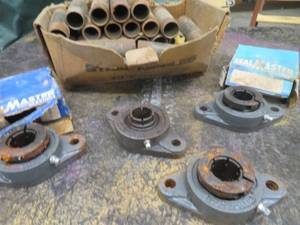 lot 24 image: SEALMASTER BEARINGS THEY ARE A TAD RUSTY AND BLACK STEEL PIP FITTINGS