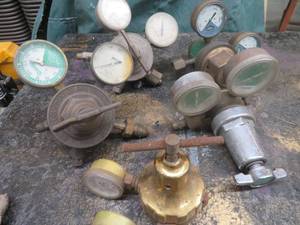 lot 27 image: WELDING GAUGES.  AND  SOME SERIOUS BRASS REGULATORS