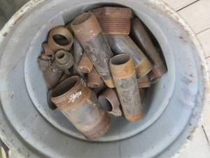 lot 37 image: BUCKET OF BLACK FITTINGS