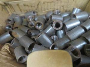 lot 65 image: 18 BLACK COUPLINGS
