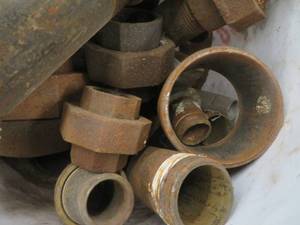 lot 76 image: BUCKET OF LARGER FITTINGS