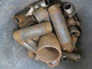 lot 78 image: BUCKET OF LARGER PIPE AND FITTINGS.