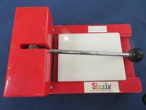 lot 98 image: SIZZIX ORIGINAL RED PERSONAL DIE-CUTTER PRESS MACHINE