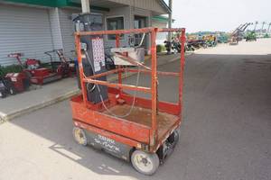 lot 29 image: 2013 Sky Jack Model SJ12 Vertical Mast Man Lift