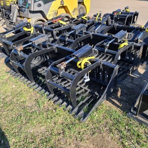 lot 12 image: Brand New Made In America Universal Mount Bobcat Skid Loader Skid Steer 68 RockSkeleton Grapple Bucket