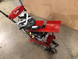 lot 35 image: Toro 58602 Full Size Front Tine Tiller 163cc Briggs & Stratton 4 Cycle Engine Adjustable Tilling Width up to 21 inchess Variable Wheel Settings For Parts  Customer Returns See Pictures