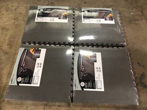 lot 36 image: 4 Lots of TrafficMaster BlackGray 24 in. x 24 in. x .52 in. Foam Dual Sided Impact Gym Floor Tiles (4 TilesPack (16 sq. ft.  Customer Returns See Pictures