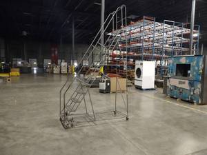 lot 107 image: Tri-Arc Rolling Safety Ladder, 9 1...