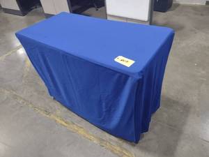 lot 606 image: (8) 4x2 Fitted & Skirted Table Cl...