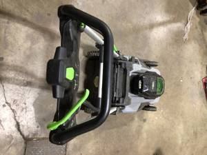 lot 31 image: EGO POWER 56-volt 21-in Self-propelled Cordless Lawn Mower dont power on  Customer Returns See Pictures