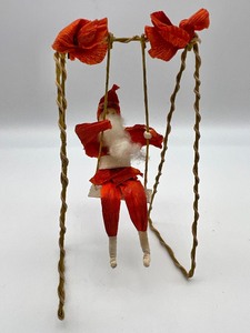 lot 91 image: Antique Vintage Crepe Santa on a Swing with German Scrap