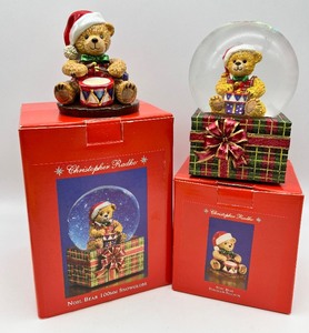 lot 107 image: RADKO Noel Bear Figurine and Snow Globe
