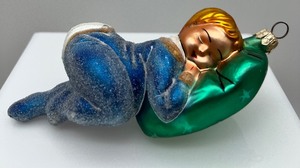 lot 162 image: RADKO Blown Glass Christmas Ornament - Sleeping Baby Boy