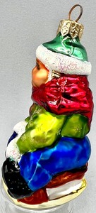 lot 171 image: RADKO Blown Glass Christmas Ornament - HERE I GO - Child on Sled