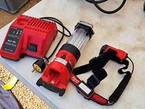 lot 122 image: Milwaukee Cordless Head Lamp, Lantern, Battery Charger M12-18C