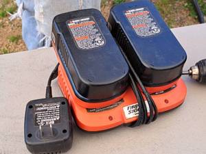 lot 143 image: Black & Decker Fire Storm Dual Charging Station with (2) 18V Cordless Tool Batteries