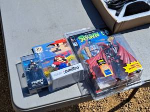 lot 229 image: Lot of (3) Collectibles - Spawn Flying Cape Posable Action Figure, Nintendo Amiibo Mario, Figpin Kratos