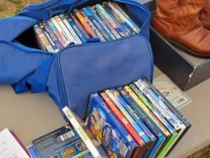 lot 246 image: Lot of (30) Movie DVDs with Dufflebag