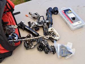 lot 248 image: Bike Bag with Bike Parts - Chains, Deraileur, Shifter, Seatpost, Heat Shrink, Misc. Parts