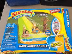 lot 250 image: Wham-o Slip N Slide Wave Rider Double Water Slide (in original packaging)