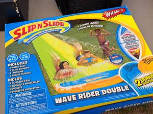 lot 251 image: Wham-o Slip N Slide Wave Rider Double Water Slide (in original packaging)