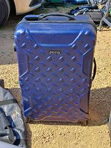 lot 274 image: Jeep Rolling Luggage