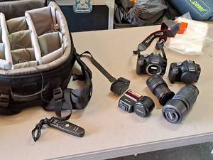 lot 360 image: Lot of (2) Canon EOS Rebel T1i Cameras with Tamron 70-300mm Lens, 18-55mm Lens, 50mm Lens, Flash Unit, Aputure Timer Remote Controller AP-TR-3C, Accessories and Camera Bag