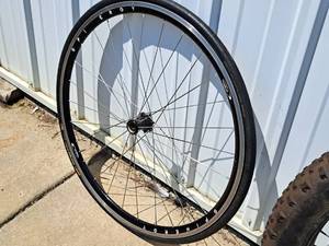 lot 407 image: Spinergy SR3 24 Front Bicycle Rim with Continental Super Sport 25cm Tire