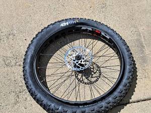 lot 408 image: 22 Front Bicycle Rim with 45NRTH Dillinger 4 Fat Tire Bike 26x4.0 Tire and Disc Brake Assembly
