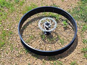 lot 411 image: 22 Front Bicycle Rim with Disc Brake Assembly