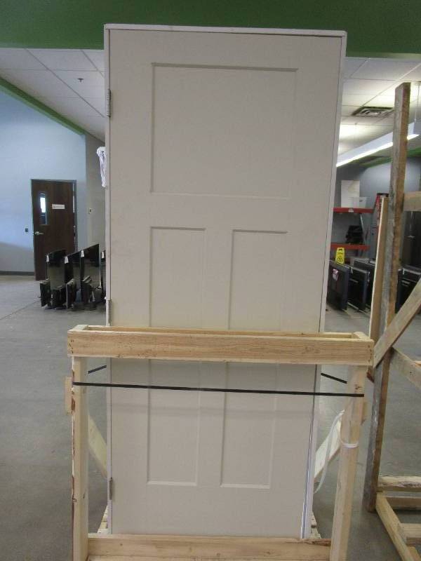 lot 917 image: 32 in x 80 in Pre-Hung 3 Panel Primed Interior Door, Single Bore, RH Swing with Nickel Hinges (SCRATCH & DENT)