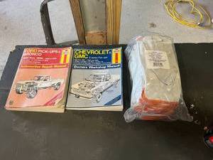 lot 57 image: Pickup Repair Manuals & New Leather Gloves