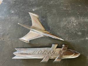 lot 91 image: Hood Ornament & Hornet Emblem