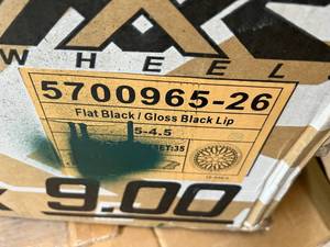 lot 100 image: 4 New in Box 20x10.5 Flat BlackGloss Black Lip 5 Bolt Rims