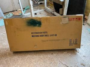 lot 103 image: NIB Mustang Door Shell LH 67-68